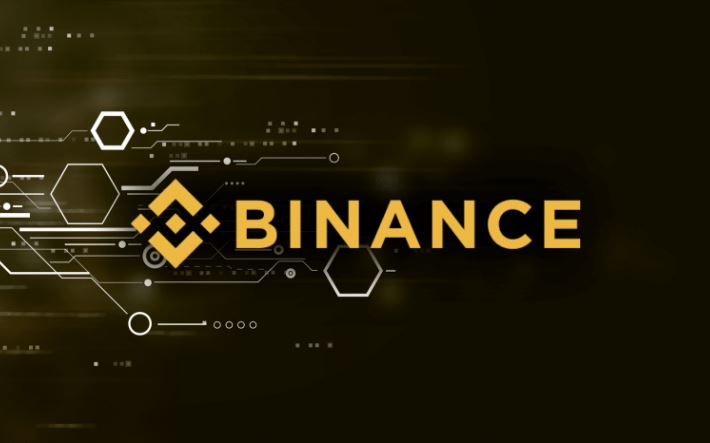 Binance (BNB) e símbolo da criptomoeda ao centro em amarelo. O fundo é preto com detalhes em linhas de programação.